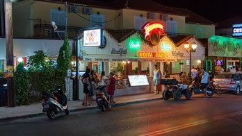 Greek island where American tourist was killed known for debauchery, violence