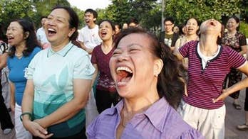 Laughing yoga cultivates merry mindfulness