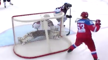 Russian hockey player scores awesome lacrosse-style goal