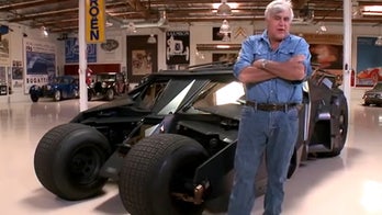 Jay Leno gets behind the wheel of the Batmobile