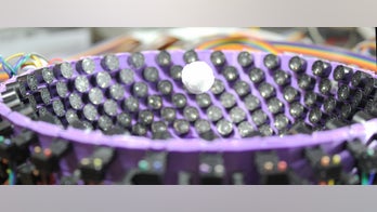 Tractor beam levitates large orbs with sound