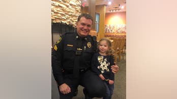 Little girl joins cop eating alone for 'best dinner date ever'