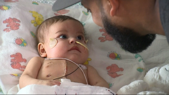 Infant whose heart was in wrong place saved by transplant