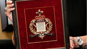 Bibles flown to moon stir ownership dispute