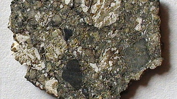 Mineral found in lunar meteorite hints at hidden Moon water