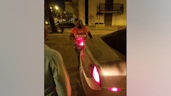 Lyft driver pulled gun on passengers, used homophobic slur, lawsuit alleges