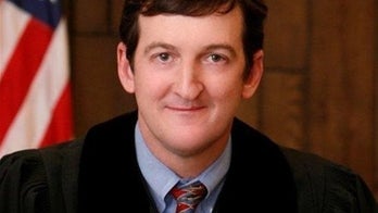 Ex-judge can't take back his guilty plea in bribery case, court rules