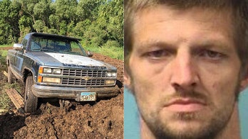 Burglary suspect nabbed after getaway vehicle gets stuck in large manure pile