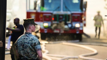 Marines come running to help after fire breaks out at DC senior building, video shows