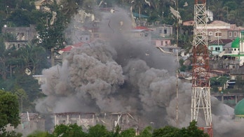 US spy planes help Philippine troops quell siege