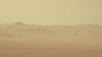 PHOTO: NASA's Curiosity rover is tracking a huge dust storm on Mars