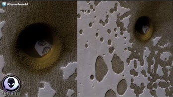 Giant hole on Mars could be work of aliens, researchers say