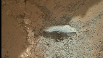 NASA's Curiosity rover hammers into 1st Mars rock