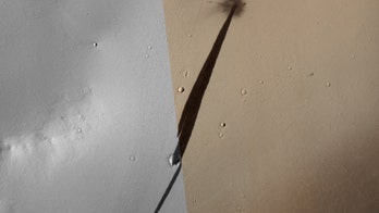 This fresh meteoroid impact on Mars triggered a dusty avalanche
