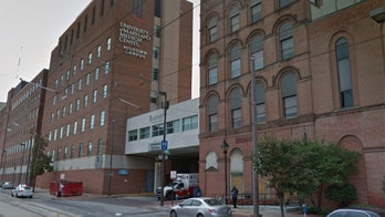 Baltimore hospital says it 'failed' after shocking video emerges of patient being left on street