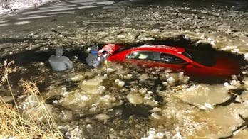 Massachusetts man rescued as his car was sinking into frozen pond