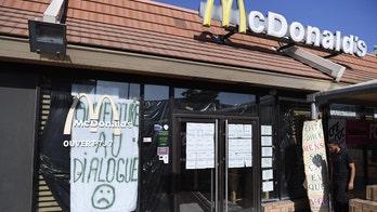 French residents fight to stop McDonald's from closing