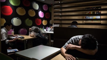 Number of Hong Kong McDonald's 'McRefugees' sleeping in restaurants has skyrocketed