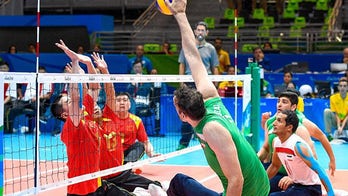 Paralympics' tallest ever athlete competes in sitting volleyball