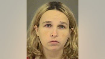 Mom accused of chaining her four kids to their beds