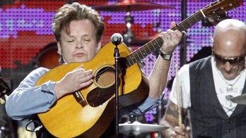 John Mellencamp's second son surrenders on charges that he attacked man in Indiana