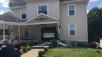 Driver who crashed into house says he blacked out after giving blood