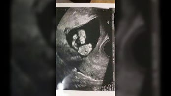 Georgia baby salutes Marine dad in utero
