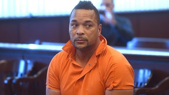 Ex-con charged with killing 4 at home in Detroit area