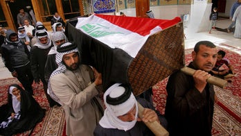 Suicide truck bombing by ISIS kills at least 61, Iraqi officials say