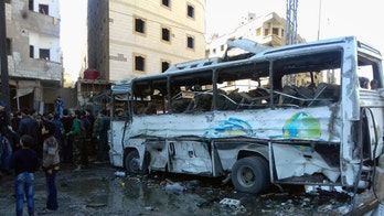 ISIS claims bombings that kill dozens, as Kerry pushes 'peaceful' Syria