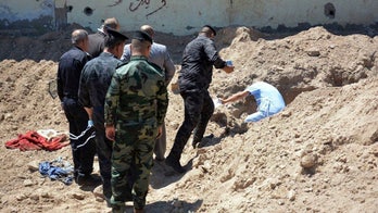 Iraqi police find 2 mass graves in ISIS-free Ramadi
