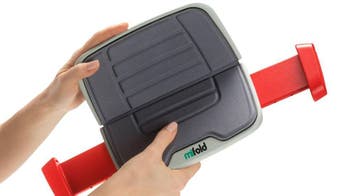 Inventive folding booster seat designed to put safety in the palm of your hand