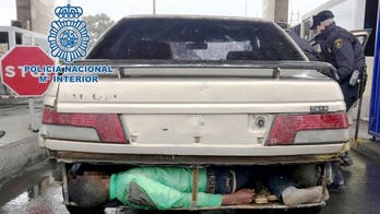Cops find three migrants hidden in specially built compartment under car
