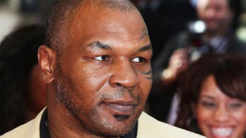 Mike Tyson nearly knocks out trainer in lead-up to Roy Jones Jr. exhibition match