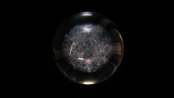 With 200,000 laser dots, this glass orb puts the Milky Way on your desk