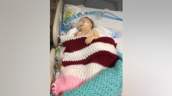 Toddler at center of brain death test battle between parents and hospital dies