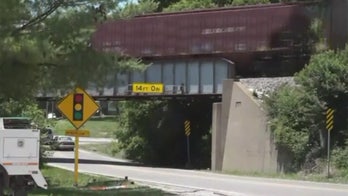Missouri woman, newborn nearly crushed after metal plate tie falls from train bridge
