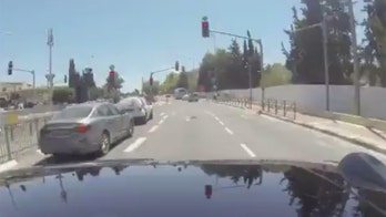Self-driving car caught on camera running red light