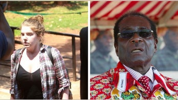 American woman, 25, jailed for calling 93-year-old African dictator a 'sick man,' faces 20 years in prison