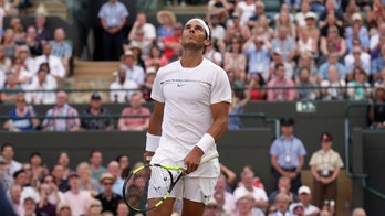 Rafael Nadal beaten at Wimbledon by Gilles Muller in five-set thriller