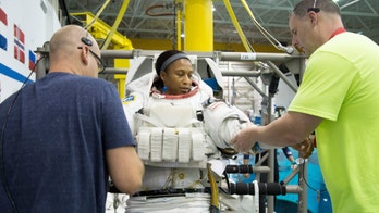 Brother of African-American NASA astronaut pulled from historic space station mission blames racism