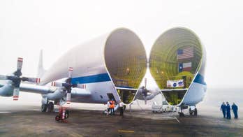 NASA transports Orion spacecraft by Super Guppy cargo plane