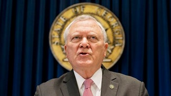 Georgia governor vetoes 'campus-carry' concealed gun bill