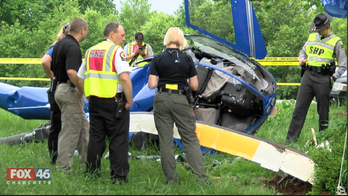 Helicopter hits NC home, crashes; 2 hospitalized