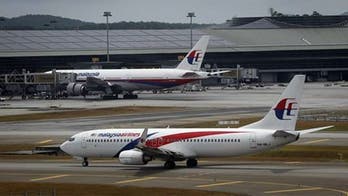 Missing Malaysia flight's path reportedly diverted through computer system