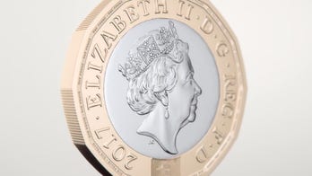 Britain's new pound coin may not fit into vending machines