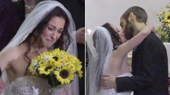 Couple who postponed wedding plans after dual cancer diagnoses tie the knot