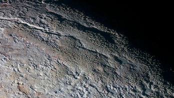 Scientists finally understand Pluto's ice towers