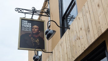 Nicolas Cage-obsessed pub displays actor's face on sign