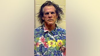 Nick Nolte talks 2002 arrest photo: 'I looked like an asylum inmate out for a lark'